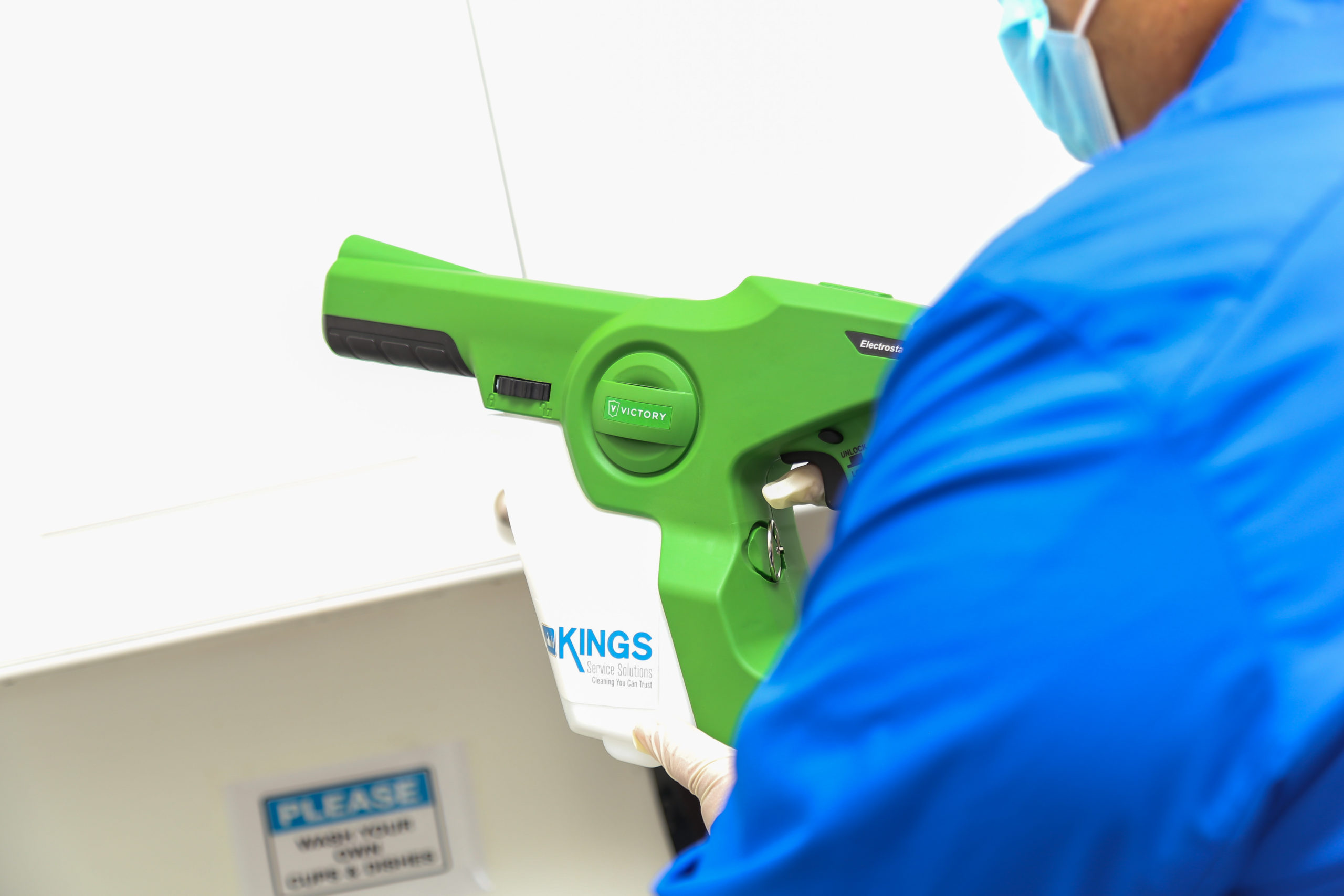 Person cleaning a sanitary device